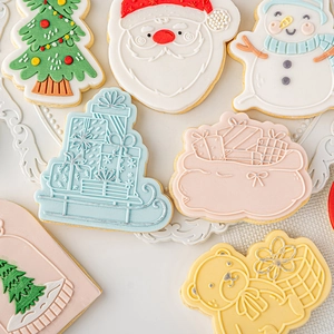Assorted Christmas cookie cutters set featuring Santa, Reindeer and Tree fondant designs