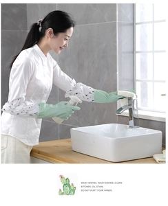 Close-up of long green rubber gloves with cactus pattern cuffs for kitchen cleaning