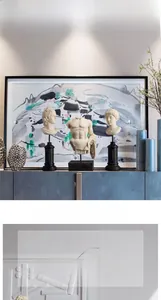 Classic ivory resin bust sculpture set on black pedestal for modern home decor