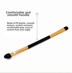 Detail of dual-ended makeup brush featuring sponge tip and fine fiber bristles