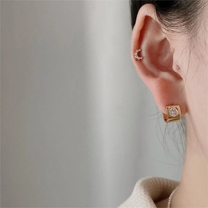 925 silver gold heart and moon earrings with clear cubic zirconia on ear lobe