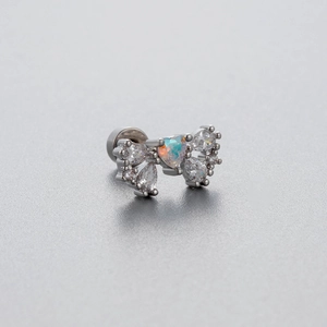 Silver bow-shaped titanium steel ear stud with iridescent opal heart and clear zircons