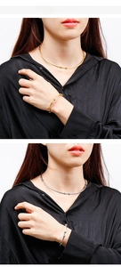Close-up of minimalist titanium steel collar necklace and matching ball bead bracelet