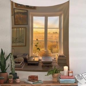 Detail of bohemian tapestry featuring a warm sunset window view for cozy home decor