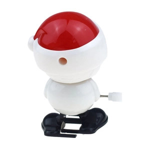 Detail of wind-up toy showing mechanical side knob and red walking snowman figure