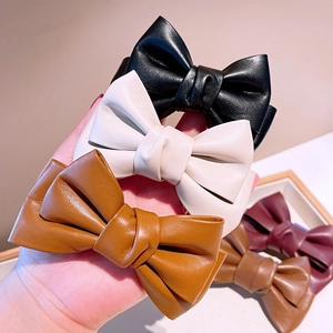 Barrettes à cheveux vintage en cuir aux couleurs noir, crème, caramel et bordeaux