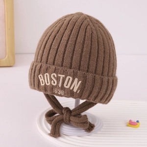 Brown thick knit winter hat for babies with white Boston embroidery and ties