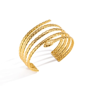 Gold snake wrap cuff bracelet with 18K plating and textured scales on white background