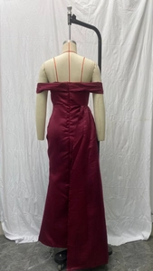 Detailed back view of burgundy off-shoulder satin evening gown with invisible zipper