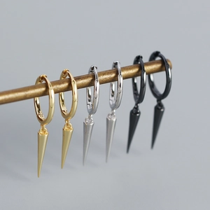 Detailed view of S925 silver hoop earrings with long cone spikes in gold, silver, and black