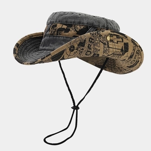 Macro view of wide brim sun hat featuring vintage denim and newspaper print fabric detail