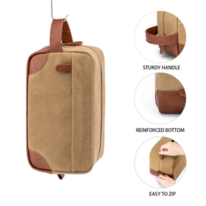 Details of men's canvas toiletry bag featuring sturdy handle and reinforced bottom
