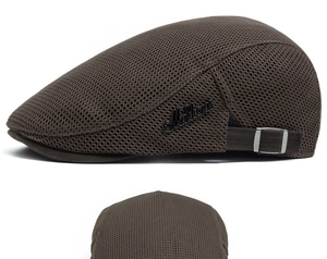 Detail of coffee mesh newsboy cap showing breathable fabric and adjustable metal buckle