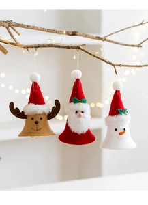 Detail of plush reindeer, Santa, and snowman bell ornaments hanging on Christmas tree branches