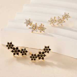 Elegant gold S925 silver flower stud earrings set with white and black zircon stones
