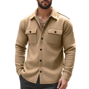 Detail of khaki fleece-lined jacket with black buttons and dual chest pockets