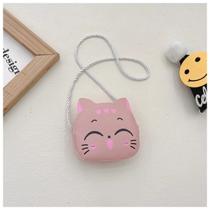 Detailed view of a pink cat-shaped children's coin purse with woven shoulder strap