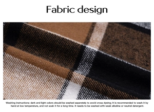 Detail view of brown, black, and white plaid fabric texture with English washing instructions