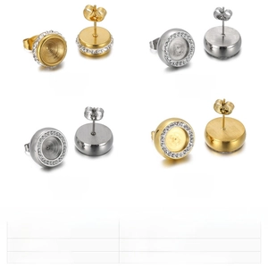 Macro detail of stainless steel earring components with micro-pave crystals and sizes