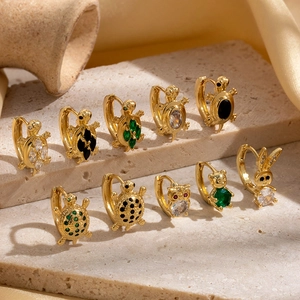 Detailed assortment of animal-shaped gold earrings with colorful zircon inlays