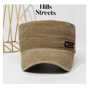 Detail of vintage washed canvas military cap featuring ribbed stitching and side metal plaque