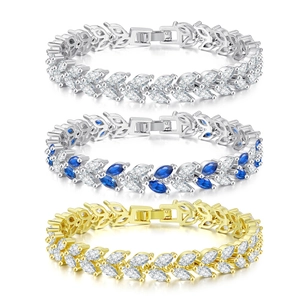 Detailed view of three leaf-shaped marquise cut zircon bracelets in silver and gold finish