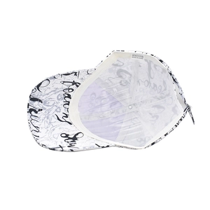 Detail of internal wash label and 100% polyester material on white graffiti baseball cap