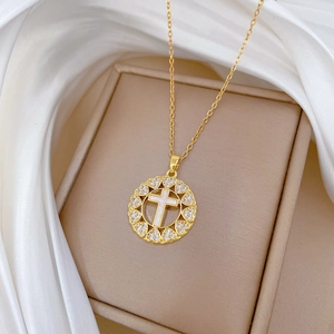 Luxurious gold stainless steel necklace with heart-shaped crystal pendant and shell cross