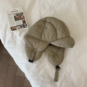 Winter khaki quilted bomber hat with earflaps and windproof buckle for outdoor warmth