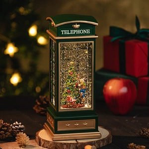 Vintage green telephone booth Christmas snow globe lantern with festive tree and gifts