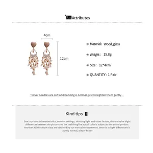 Detailed size chart showing dimensions 12x4cm for wood heart glass tassel earrings