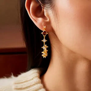 18k gold plated tiger eye C-shape drop earrings with retro starburst design for women