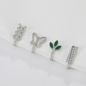 Set of four silver non-piercing nose rings with zircon leaf and butterfly designs