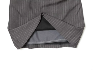 Detail of grey pinstripe fabric showing high-quality stitching and interior lining
