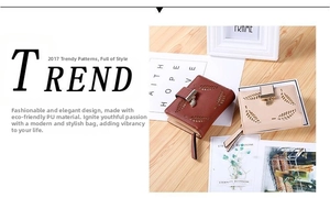 Detail of leaf cut-out design on eco-friendly PU leather wallet with metal zipper