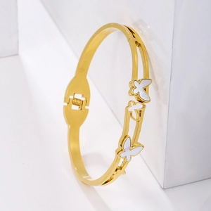 Golden stainless steel hinge bracelet with white butterfly shell inlay on white cubes