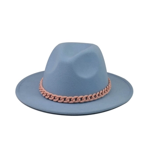 Detail view of light blue wool fedora featuring a contrast pink thick chain decoration