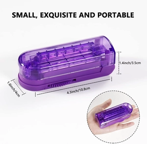 Purple portable pill cutter dimensions 10.8x4x3.5cm with compact handheld scale view