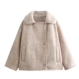 Women's apricot faux suede jacket with thick white shearling lining and wide lapels