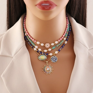 Multilayer natural stone eye pendant necklace with golden sun beads on mannequin