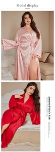 Detailed view of long sleeve leopard print satin robes in pink and red silk fabric