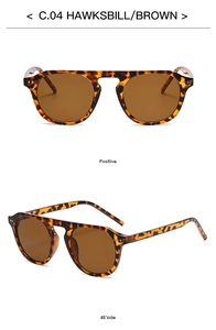 Detailed views of tortoise shell sunglasses with flat top frame and brown lenses