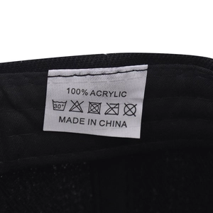 Detail of Brooklyn snapback interior showing 100% acrylic care label and quality stitching