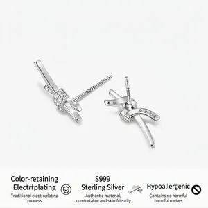 Minimalist S999 sterling silver knot earrings with pavé crystals in polished finish
