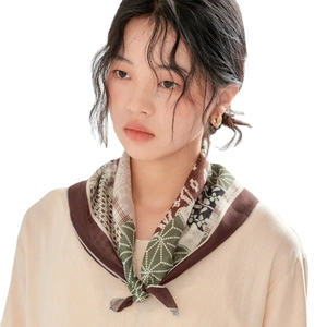 Asian model wearing a Japanese style floral linen scarf with geometric patterns