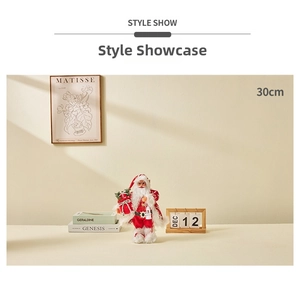 Detailed 30cm standing Santa Claus figurine with gift bag and white lantern decor