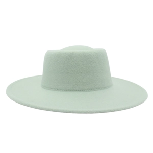 Detailed top view of light mint green wool felt flat top boater hat with wide brim