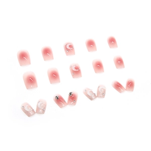 Faux ongles dégradés roses avec lunes blanches et paillettes argentées pour femmes
