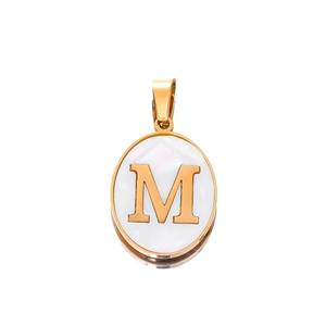 Detailed macro of 22mm stainless steel oval pendant with mother of pearl and golden letter M