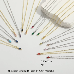 Minimalist elliptical zircon necklace set featuring colorful pendants and delicate gold chains